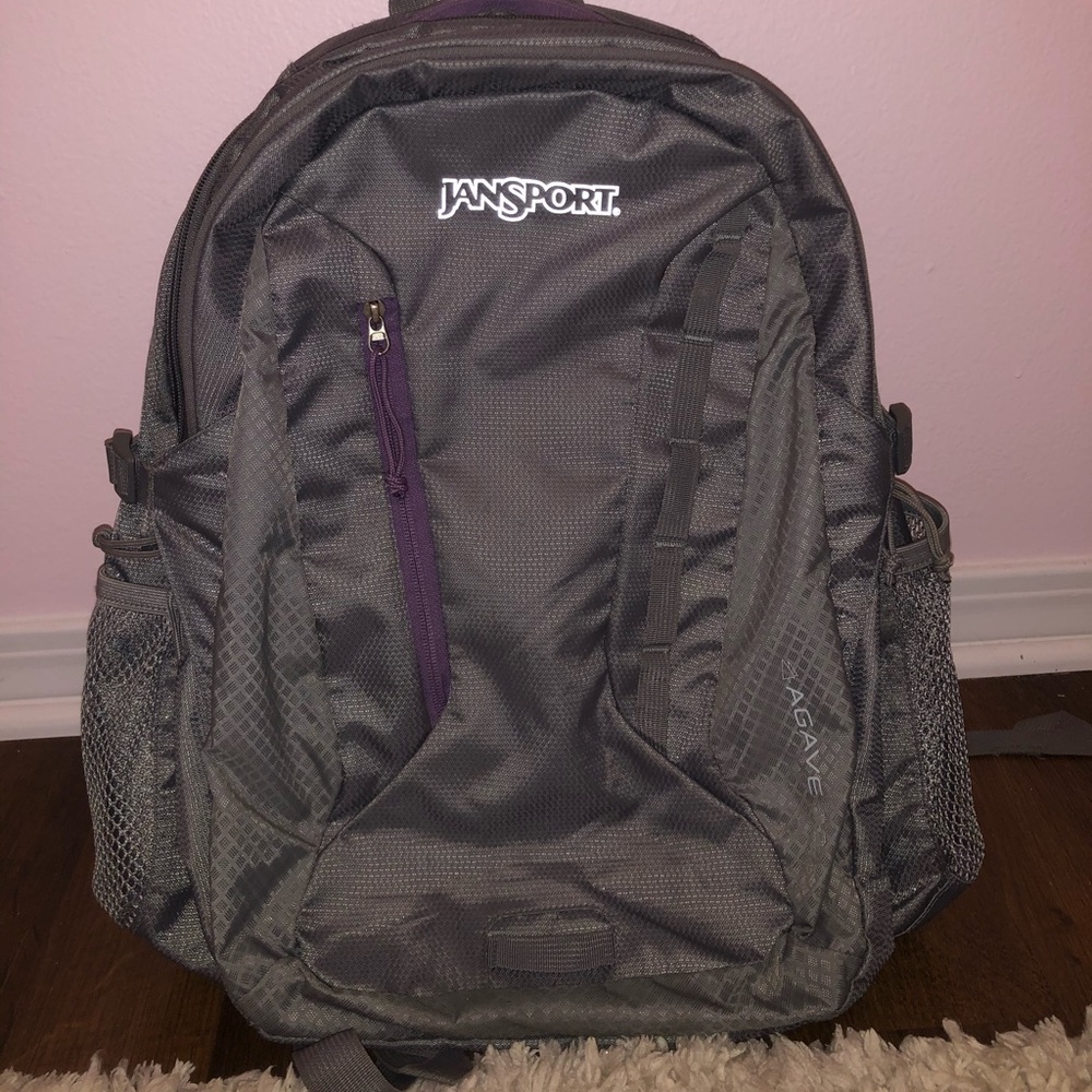 Purple and grey jansport backpack/ north face dupe